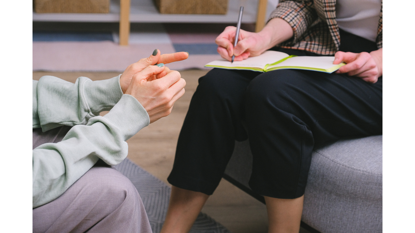 silhouette photo of man on cliff during sunset